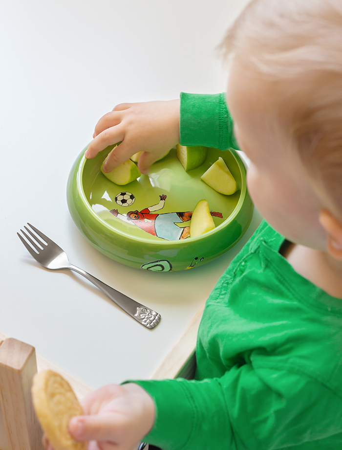 Tischmanieren lernen: Kinder am Tisch